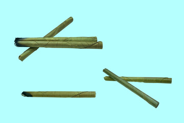 cigarette made from the leaves  on  a blue background,many styles with clipping path