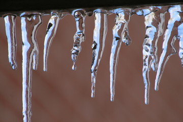 Icicles against red background