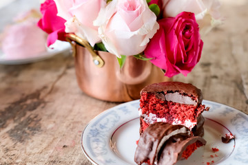 Red velvet cake and flowers.