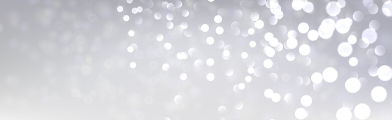 Christmas and New Year horizontal card with defocused ligths on grey. - obrazy, fototapety, plakaty