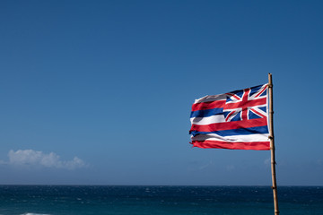Fototapeta premium Hawaiian flag in the wind