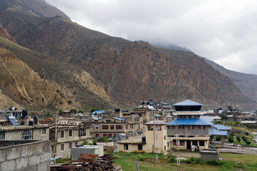 Fototapeta na wymiar View of the traditional residential area of ​​Jomsom at the foot of the Himalayan Mountains in Nepal, Mustang area.