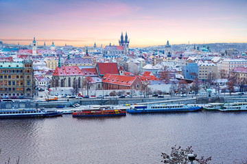 Prague. Czech Republic. The view from the height.  	New year's Prague, one of the most beautiful European cities, is like a fairy tale come to life: Gothic cathedrals, snow-capped roofs of houses.