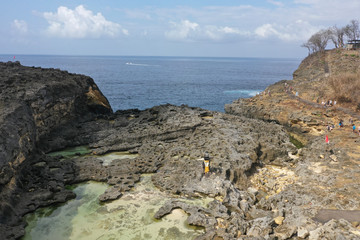 Aerial View of landscape over Broken Beach in Nusa Penida, Indonesia Angels BillaBong Beach. Popular tourist destination in Bali.