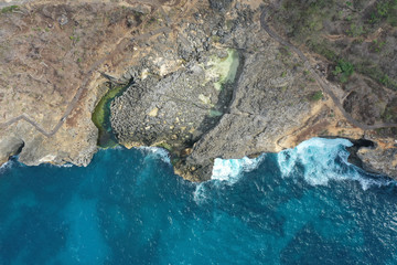 Aerial View of landscape over Broken Beach in Nusa Penida, Indonesia Angels BillaBong Beach. Popular tourist destination in Bali.