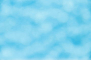 Gentle blue bokeh background. Abstract blurred background. Bokeh texture. Design concept. Horizontal