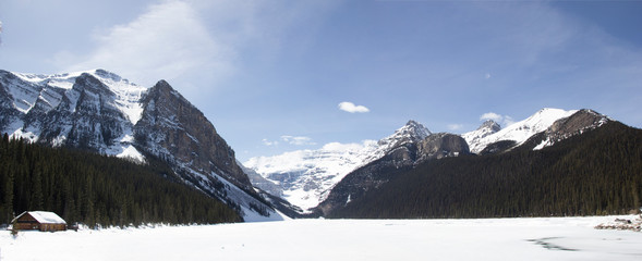 Panorama of Mountain Range with Snow Covered Field