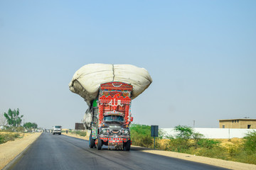 overloaded truck on the road