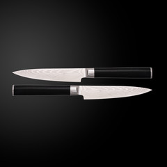 Two Japanese Damascus X100 Knives on a dark background