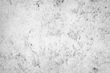 Texture of a concrete wall with cracks and scratches which can be used as a background