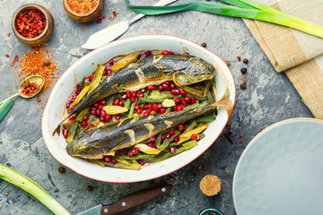 Baked fish with pomegranate
