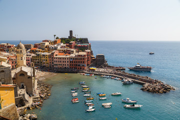 VERNAZZA / ITALY - JULY 2015: View to coastal Vernazza village in Cinque Terre land, Italy
