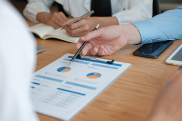 business people discussing on performance revenue in meeting. businessman working with businesswoman.