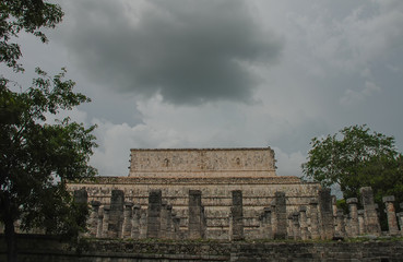 Fototapeta na wymiar The Maya ruins at Chichen Itza in in the jungle of the Yucatan in Mexico