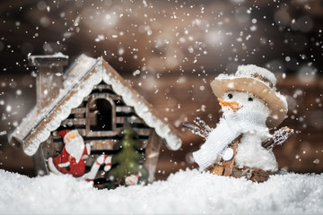 Winter season background with handmade snowman
