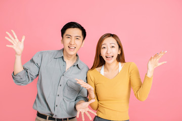 Portrait of  surprised  young couple standing together