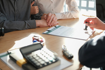 real estate agent dealer salesman using stamper for stamping approved on mortgage loan auto...