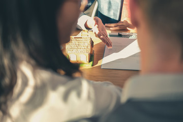 lawyer insurance broker consulting giving legal advice to couple customer about buying renting...