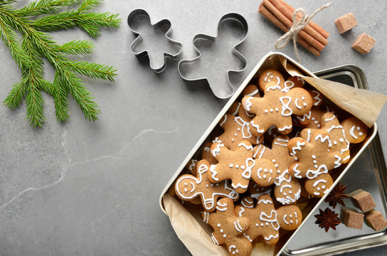 Flat Lay Christmas Background With Cookie Box Fir Palm And Cutter On Stone Table