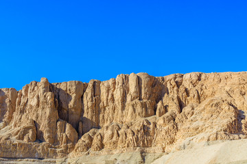 Fototapeta na wymiar View on a hills and cliffs near the temple of Hatshepsut in Luxor, Egypt
