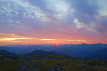 Majestic sunrise in Austrian Alps taken from Sölktal mountain with mountains in the background, Austria, Europe