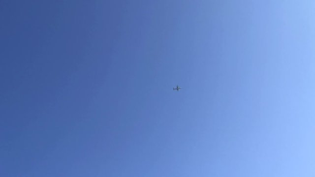 C130 Military Airplane fly over blue sky