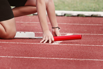 Cropped image of a sprinter getting ready to start at the stadium