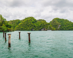 Luxury boat anchored close to exotic tropical forest. small islets where frigates and pelicans nest.Los Haitises natural park,Samana peninsula in Dominican republic.