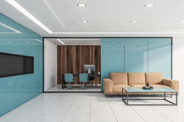 Blue office waiting room with beige sofa