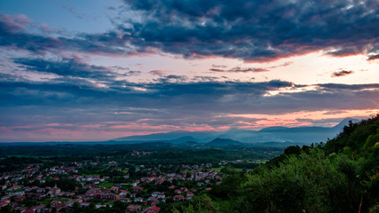 Plakat Stormy sunset in the italian countryside