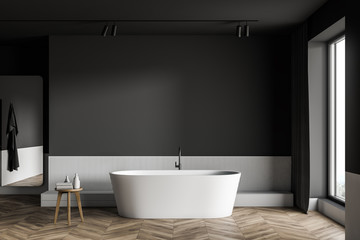 Obraz na płótnie Canvas Gray and white bathroom interior with tub