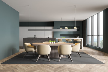 Green and white kitchen and dining room