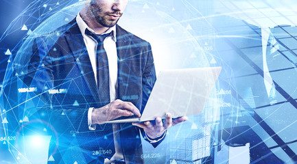 Man with laptop in city, network interface