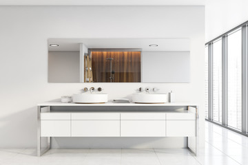 Fototapeta na wymiar Panoramic white bathroom with double sink