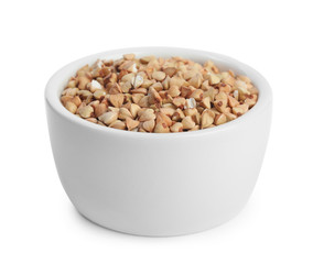 Green buckwheat in bowl isolated on white