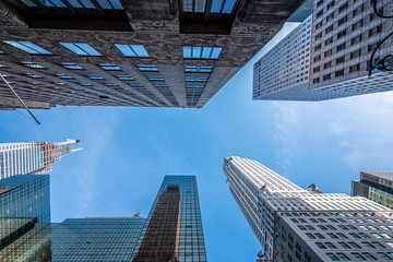Fototapeta na wymiar New York City midtown modern office skyscrappers buildings. Bottom view.