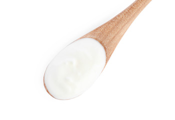 Wooden spoon with tasty organic yogurt isolated on white, top view