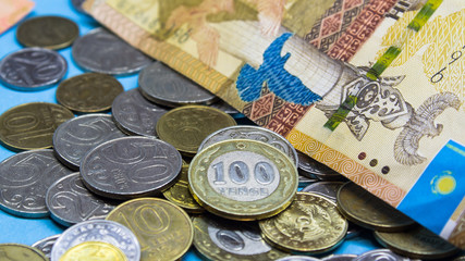 Kazakhstan tenge money with tenge coins. Economy of Kazakhstan.