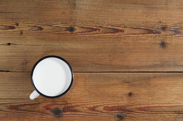 Enameled cup of milk