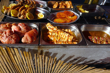 Tasty grilled dishes on a tray