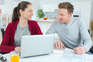 young couple of cheerful students