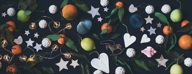 Christmas, New Year holiday background, wallpaper. Flat lay of  fur tree toys, garland, wooden ...