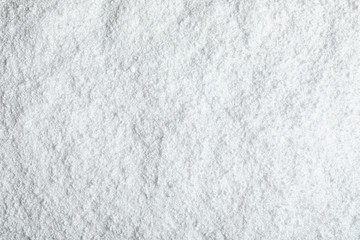 Pile of white snow as background, top view