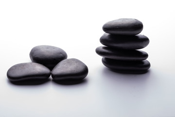Obraz na płótnie Canvas between body and mind: the Zen power of stone balance