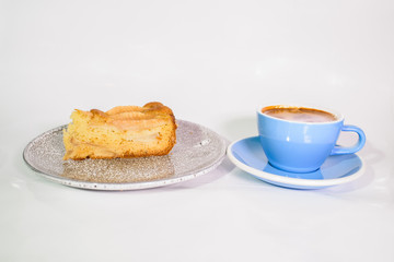 Charlotte of pears and cappuccino on a white background