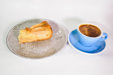 Charlotte of pears and cappuccino on a white background