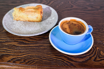 Charlotte of pears and cappuccino on a white background
