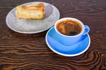 Charlotte of pears and cappuccino on a white background