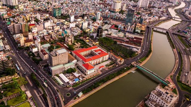 Traffic along Ben Nghe canal in Ho Chi Minh City, Vietnam time lapse