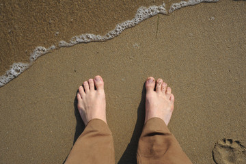 Feet by the sea